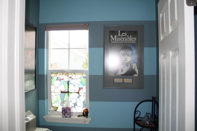 Elegant bathroom photo in Orlando with blue walls