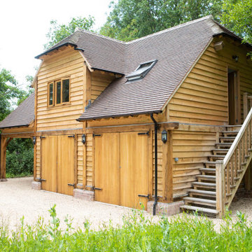 Triple bay two storey oak barn garage and home office studio in West Sussex