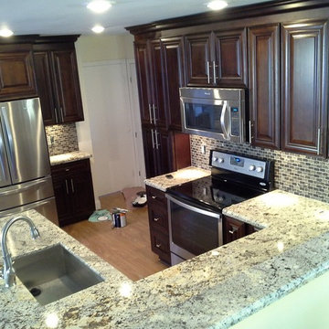 Alaskan White Granite paired with Mocha Cabinetry