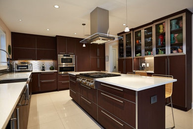 Inspiration for a mid-sized modern porcelain tile and beige floor kitchen remodel in Bridgeport with a farmhouse sink, flat-panel cabinets, brown cabinets, stainless steel appliances, an island and white countertops