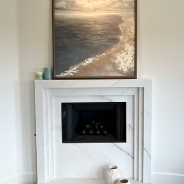 Soft-Modern Whole Home Renovation | Tiered Marble Fireplace