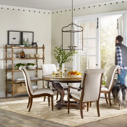 Archivist 54in Round Dining Table w/1-18in Leaf - Dining Tables