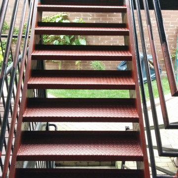 Lakeview Chicago. Front metal stairs  repair and painting