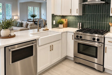 Mid-sized trendy porcelain tile kitchen photo in Charlotte with a farmhouse sink, shaker cabinets, quartz countertops, green backsplash, subway tile backsplash, stainless steel appliances, an island and white countertops