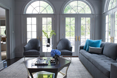 Inspiration for a large timeless formal and enclosed dark wood floor and brown floor living room remodel in New York with gray walls, no fireplace and no tv