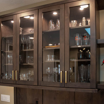 3 Finishes on Kitchen Cabinetry with Galley Workstation in Island and Wine Bar