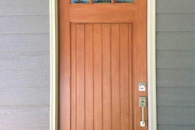 Example of a minimalist exterior home design in Other