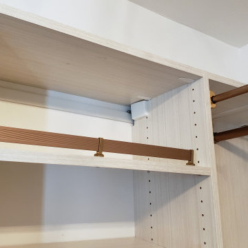 Custom master closet with full length mirror cabinet & matte gold hardware!
