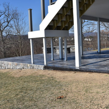 Stamped Concrete with Stone fire pit and stone wall
