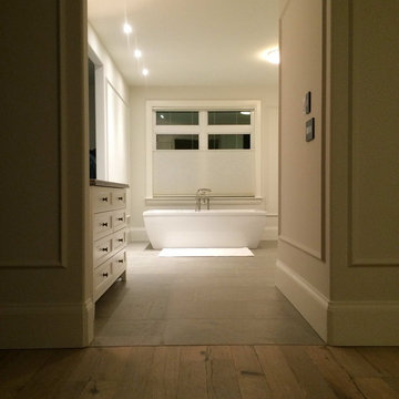 Master Bathroom with Grey Barr Reedition French Limestone Floors
