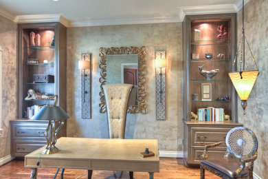 Example of a transitional home office design in Houston