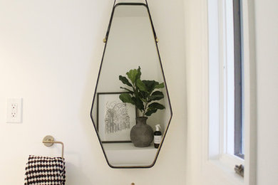 Inspiration for a transitional powder room remodel in Other
