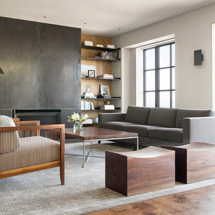 Inspiration för mellanstora moderna separata vardagsrum, med ett finrum, vita väggar, en standard öppen spis, en spiselkrans i metall och en dold TV