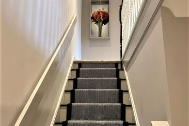 Photo of a medium sized contemporary staircase in Other.