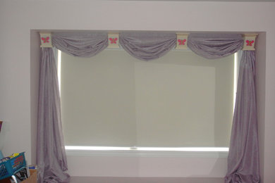 Drapery Sconces over Roller Shades