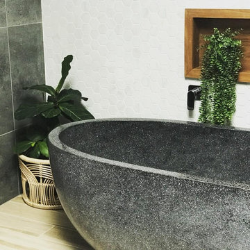 Modern Bathroom with raised free standing bath tub
