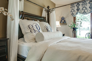 Large elegant master carpeted bedroom photo in Dallas with beige walls and no fireplace