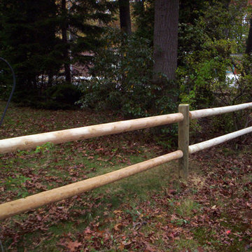 Cedar Post and Rail Fence with Round Rails