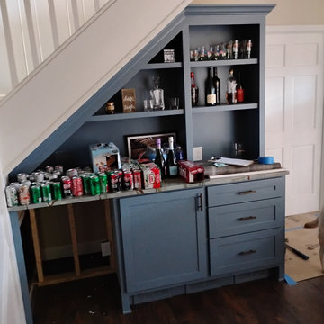 Under-stairs basement bar