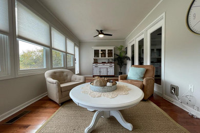 Cottage chic light wood floor and brown floor sunroom photo in Other with a standard ceiling