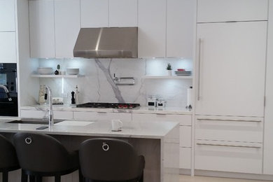 Example of a large minimalist kitchen design in Toronto