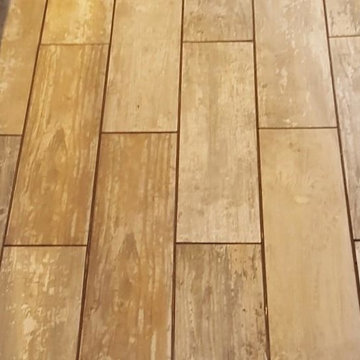 Grouting Wood Effect Porcelain floor tiles in Homes Chapel