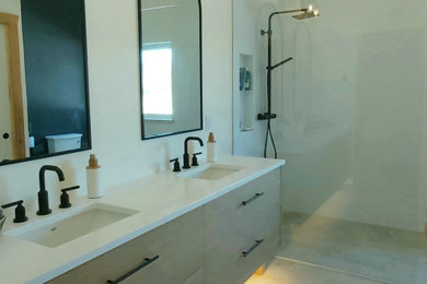 Bathroom - mid-sized scandinavian master white tile porcelain tile, beige floor and double-sink bathroom idea in Ottawa with flat-panel cabinets, light wood cabinets, a two-piece toilet, white walls, an undermount sink, quartz countertops, white countertops and a floating vanity