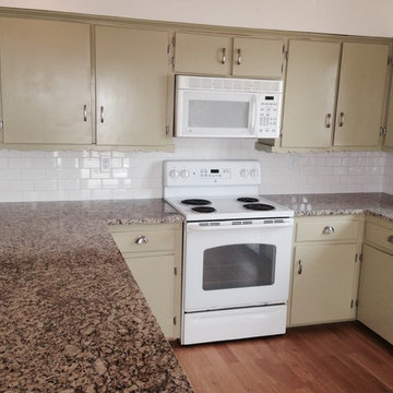 Venetian Ice Granite with 3x6 white ceramic subway tile back splash