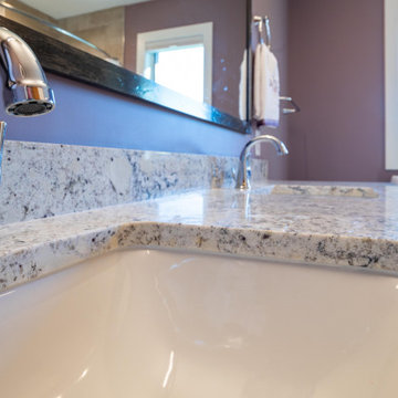 Modern Main Bathroom With a White Shaker Style Vanity and Lavender Walls