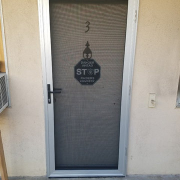 8 Mill Finish Security Screen Doors on an apartment building in Long Beach