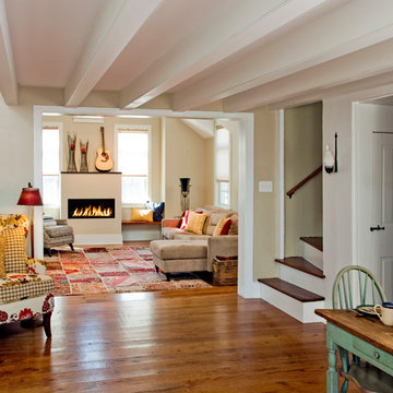 Cozy Great Room with linear Fireplace and Custom Cherry Benches
