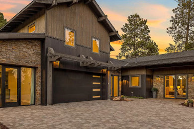 Example of a large trendy stone house exterior design in Phoenix