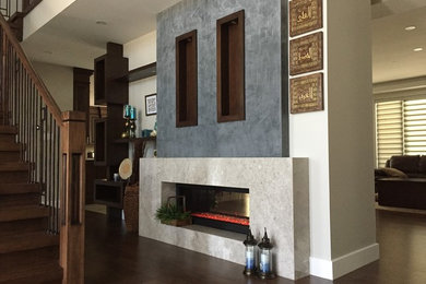 Hallway - mid-sized contemporary medium tone wood floor and brown floor hallway idea in Toronto with gray walls
