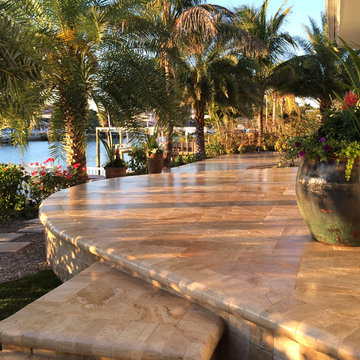 Backyard transformation features a new Travertine deck