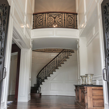 Project #74 | Circular Staircase with Hand-Forged Metal Panels