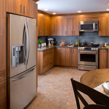 Contemporary kitchen with grey subway tiles