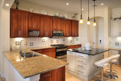Enclosed kitchen - enclosed kitchen idea in Phoenix with a drop-in sink and open cabinets