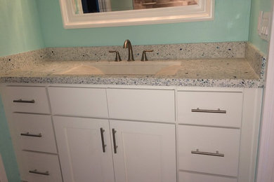 Bathroom - mid-sized modern kids' bathroom idea in Miami with white cabinets, concrete countertops and an integrated sink