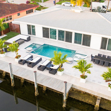 Custom Pool & Spa With Water and Fire Bowls in Pompano Beach
