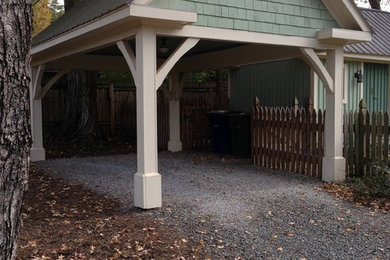 Carport - large traditional detached one-car carport idea in Other