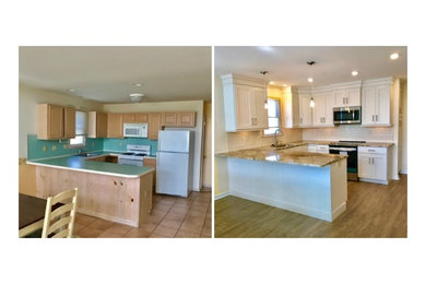 Beach style u-shaped vinyl floor eat-in kitchen photo in Other with an undermount sink, shaker cabinets, white cabinets, granite countertops, beige backsplash, subway tile backsplash, stainless steel appliances and an island