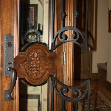 Operable Black Wrought Iron Door Wine Cellar Texas