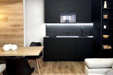 Immagine di una piccola cucina contemporanea