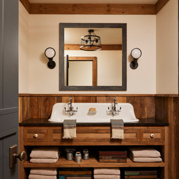 Weathered Antique Paneling and Trim in Rustic Farmhouse Bathroom
