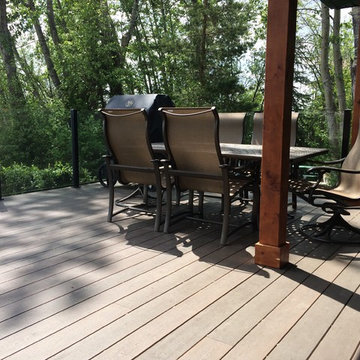 Wrap Around Composite Deck w/ Aluminum Frame-less Glass Railing in Seba Beach