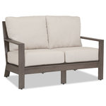 Sunset West Outdoor Furniture - Laguna Loveseat With Cushions, Canvas Flax - A re-imagination of materials, the Laguna collection from Sunset West embodies effortlessly stylish living. Crafted in lasting aluminum, with a hand-brushed finish to mimic real driftwood, Laguna captures a timeless look with modern sensibility _ offering the look and feel of natural wood, with minimal maintenance.