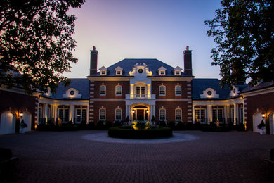 Inspiration for a huge timeless exterior home remodel in Cincinnati