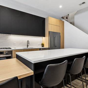 Sophisticated matte black and warm rift cut oak collision