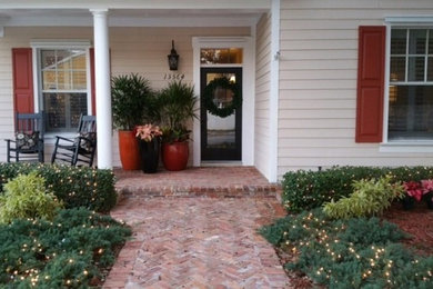 Inspiration for an entryway remodel in Tampa with a black front door