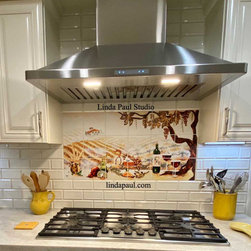Tuscan kitchen with wine vineyard tile mural and accent tiles - Tile Murals